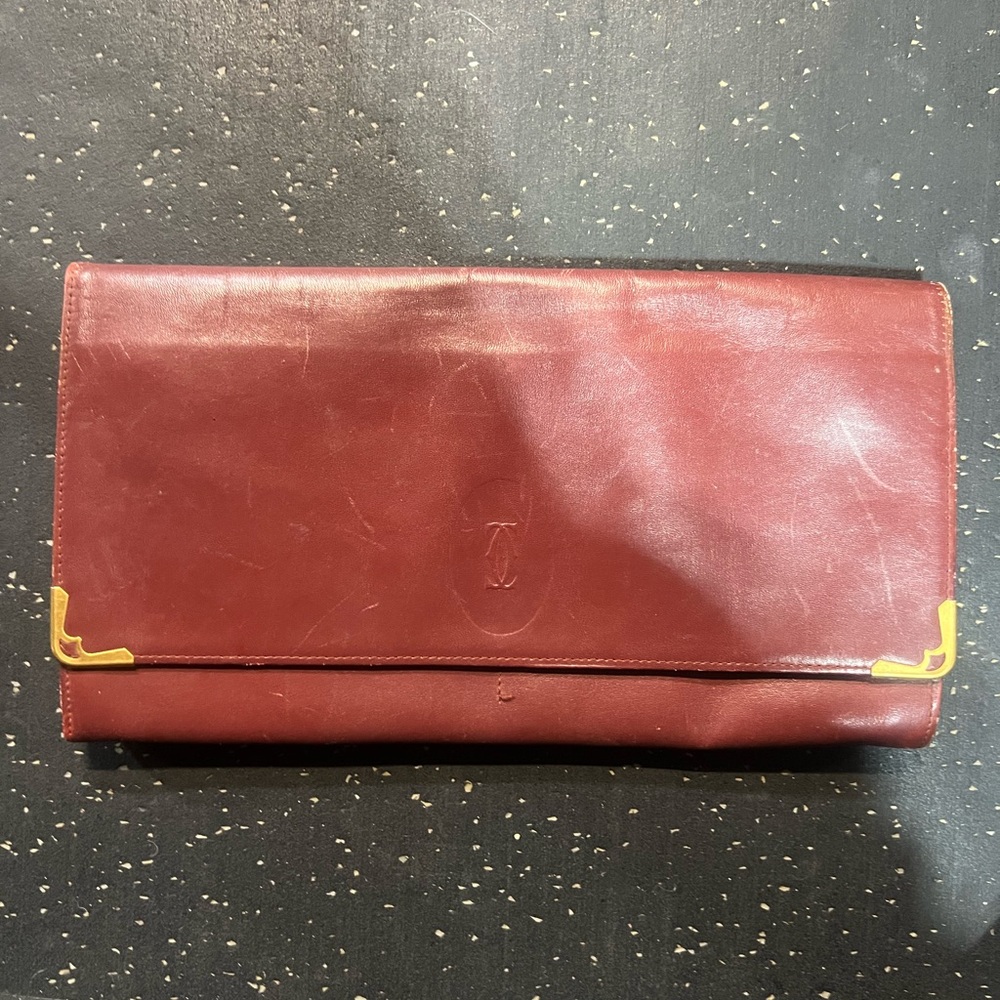 Vintage Cartier Burgundy Leather Clutch with Gold Accents